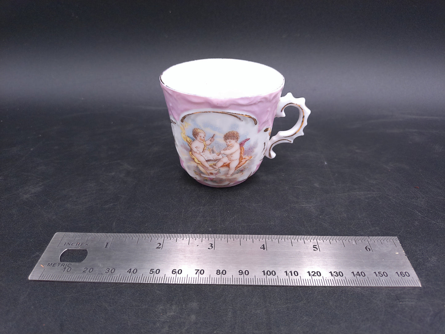Tea Coffee Cup Beautiful Design Gold Plated Lines with Cute Cherubs From the 1950s