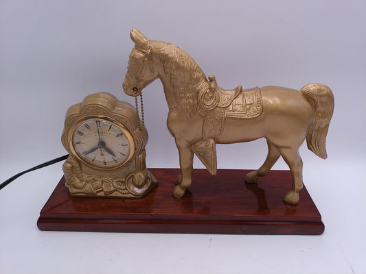 mid-century United self-starting horse clock