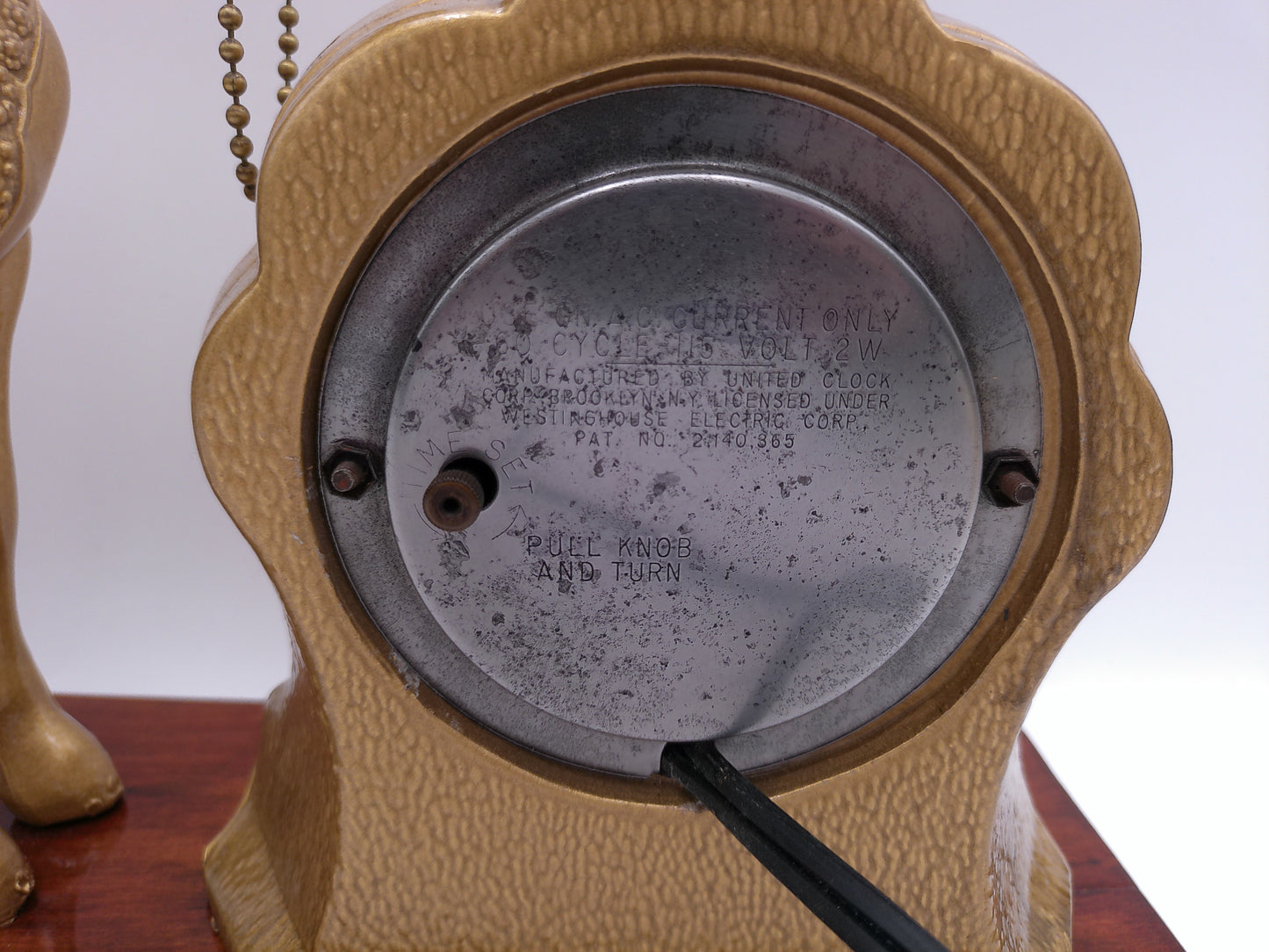 mid-century United self-starting horse clock