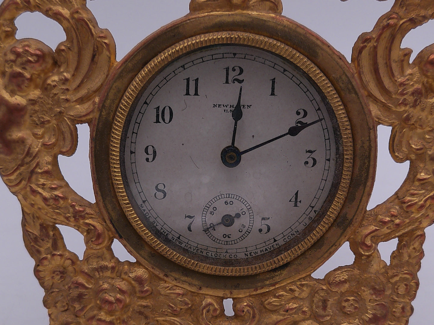 New Haven Clock Co. with Gold Brass Stand and Angels Cherubim