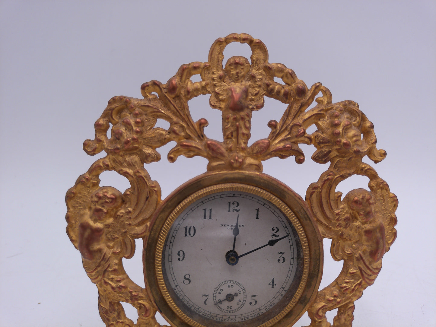 New Haven Clock Co. with Gold Brass Stand and Angels Cherubim