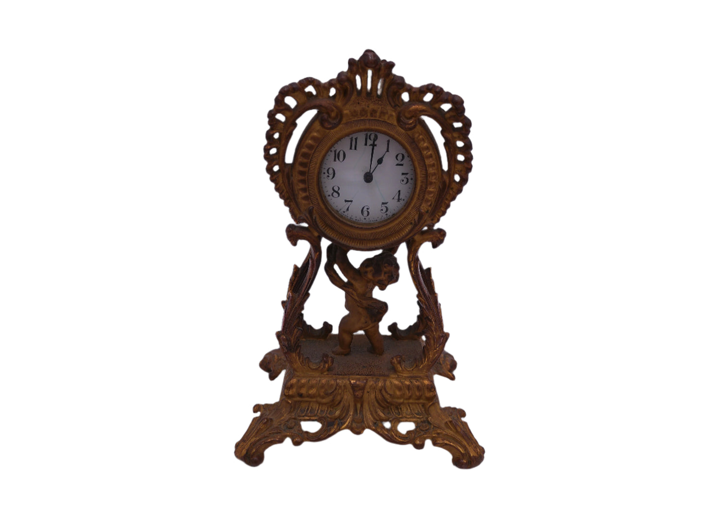Waterbury Clock Co. Brass Table Clock  featuring figural cherub and scroll motif Vintage