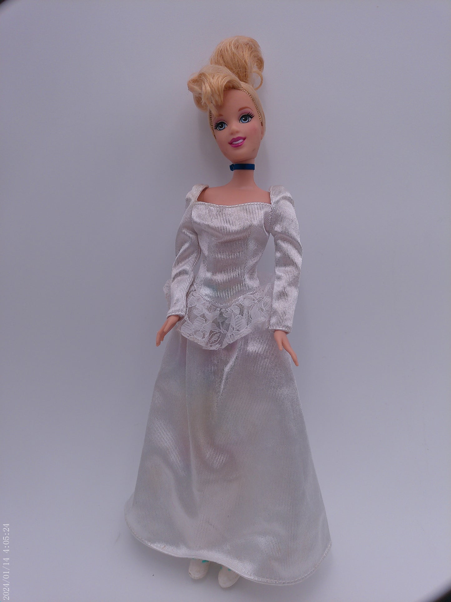 4 Vintage Barbies one is a Disney Barbie