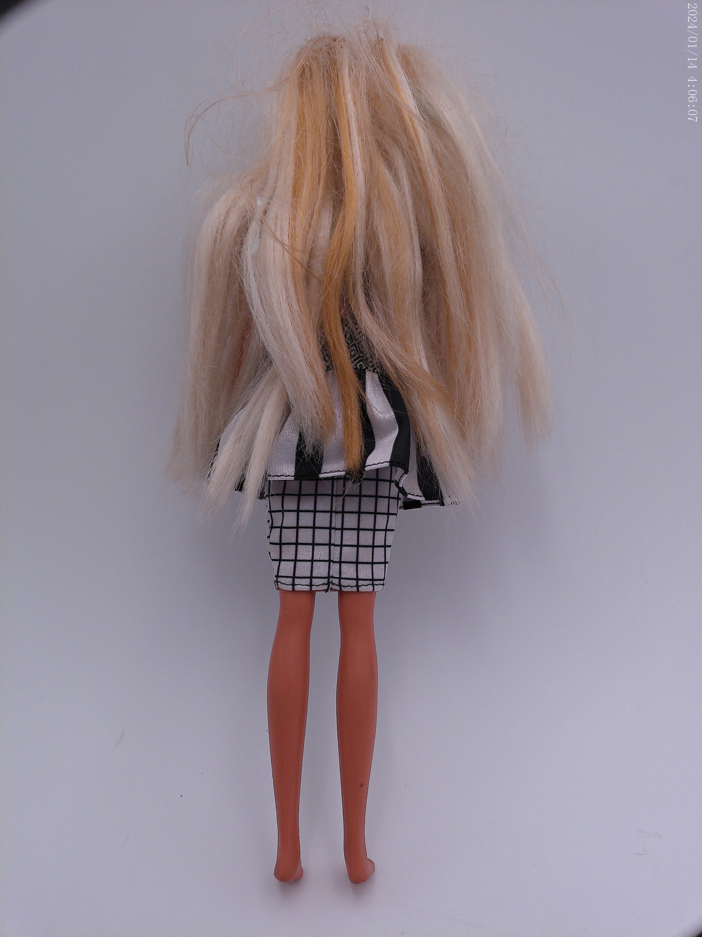 4 Vintage Barbies one is a Disney Barbie