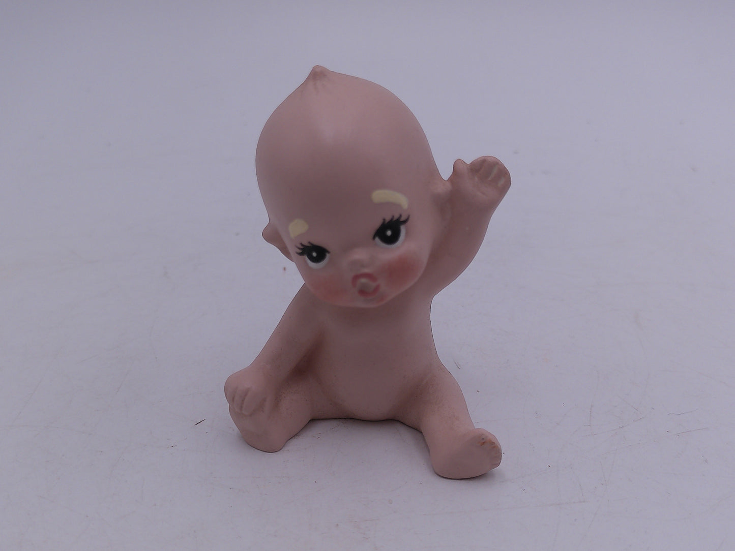 Kewpie  and other Figurines  lot of 8  and a Bell