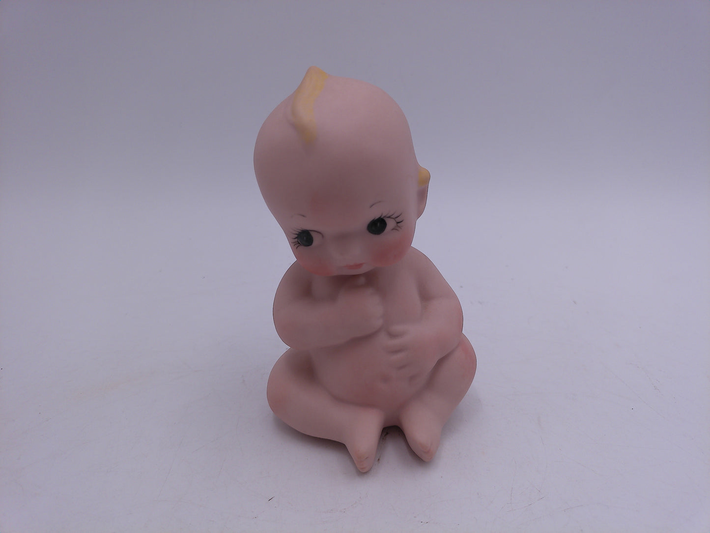 Kewpie Lot of 4 one is a bank Holding a Heart Sitting Figurines Bisque Porcelain