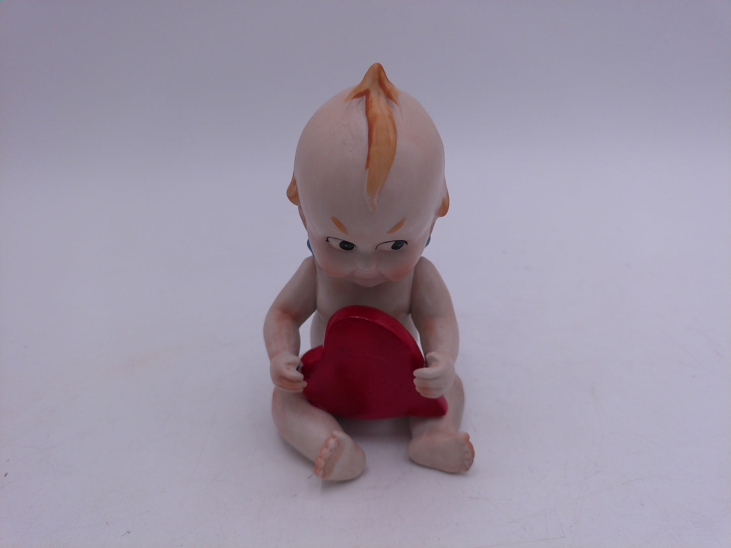 Kewpie Lot of 4 one is a bank Holding a Heart Sitting Figurines Bisque Porcelain