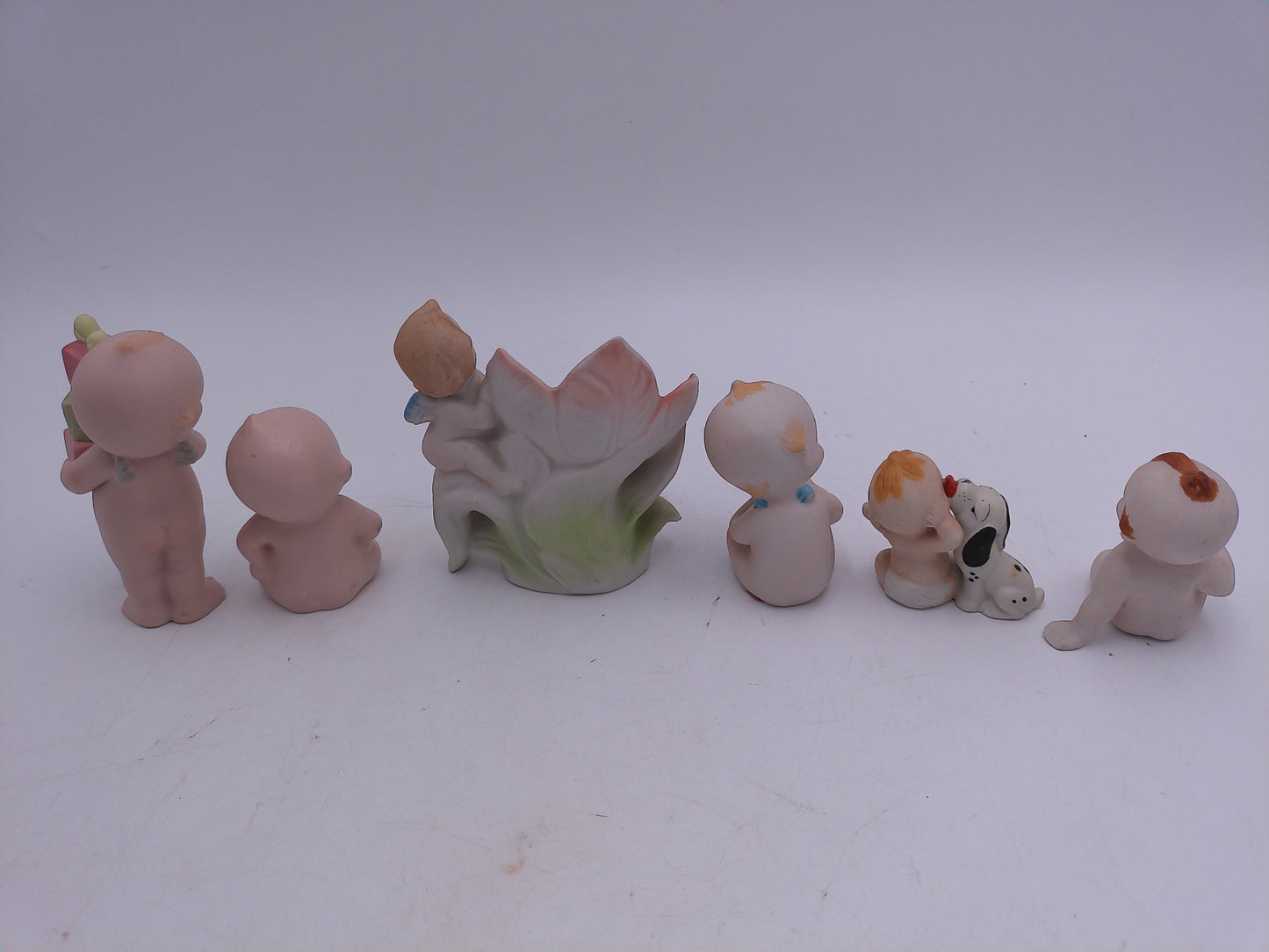 Kewpie 6 figurines Carry Gifts  Mini Bud Vase Planter Kewpie with Dog