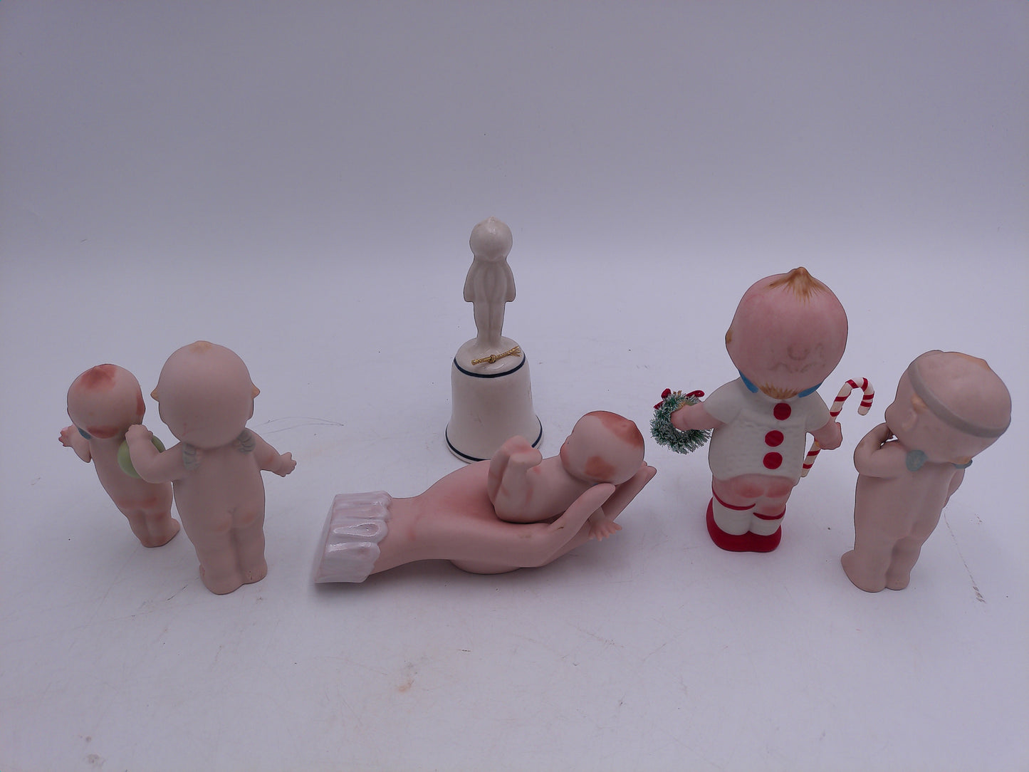 Kewpie Lot of 6 Kewpie in Hand Bell Christmas Kewpie Doll with Flowers