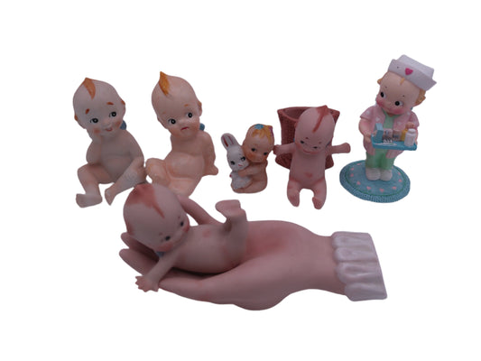 Kewpie Lot of 6 Kewpie in hand Nurse With Rabbit with Basket