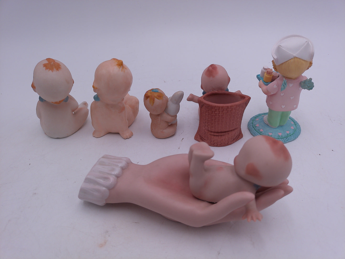 Kewpie Lot of 6 Kewpie in hand Nurse With Rabbit with Basket