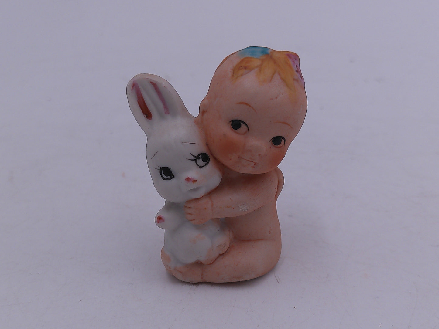 Kewpie Lot of 6 Kewpie in hand Nurse With Rabbit with Basket