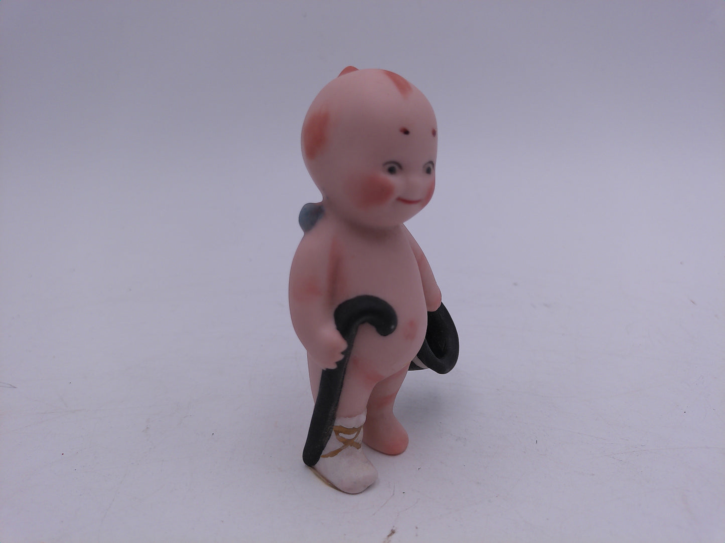 Kewpie holding Black Top Hat and Cane Super Rare