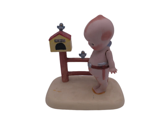 Kewpie with tool belt building Birdhouse Called Love Nest on a Fence Post Rare