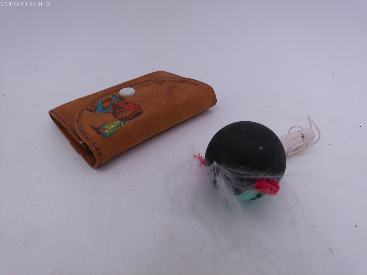 Hand Made Small Leather Bag and Colorful Indian Rattle