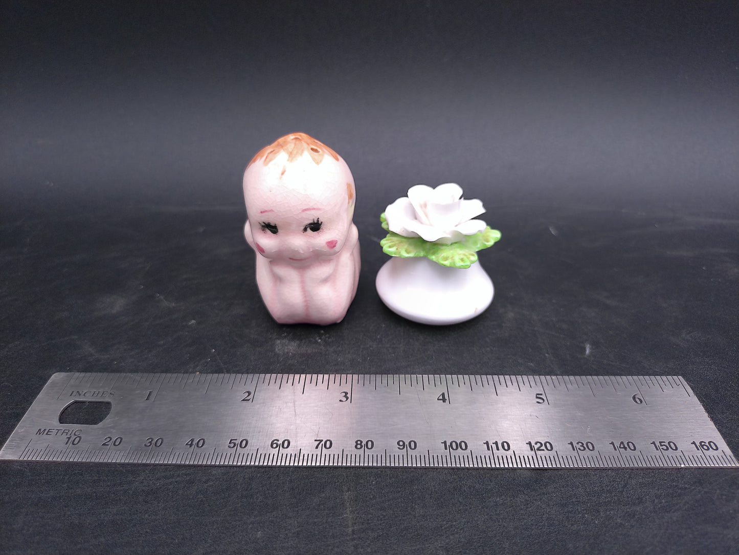 Kewpie Baby Doll Ceramic Salt Shaker And Flower Pepper Shaker