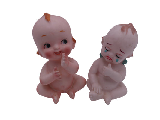Kewpie Sitting and  one Crying Figurines