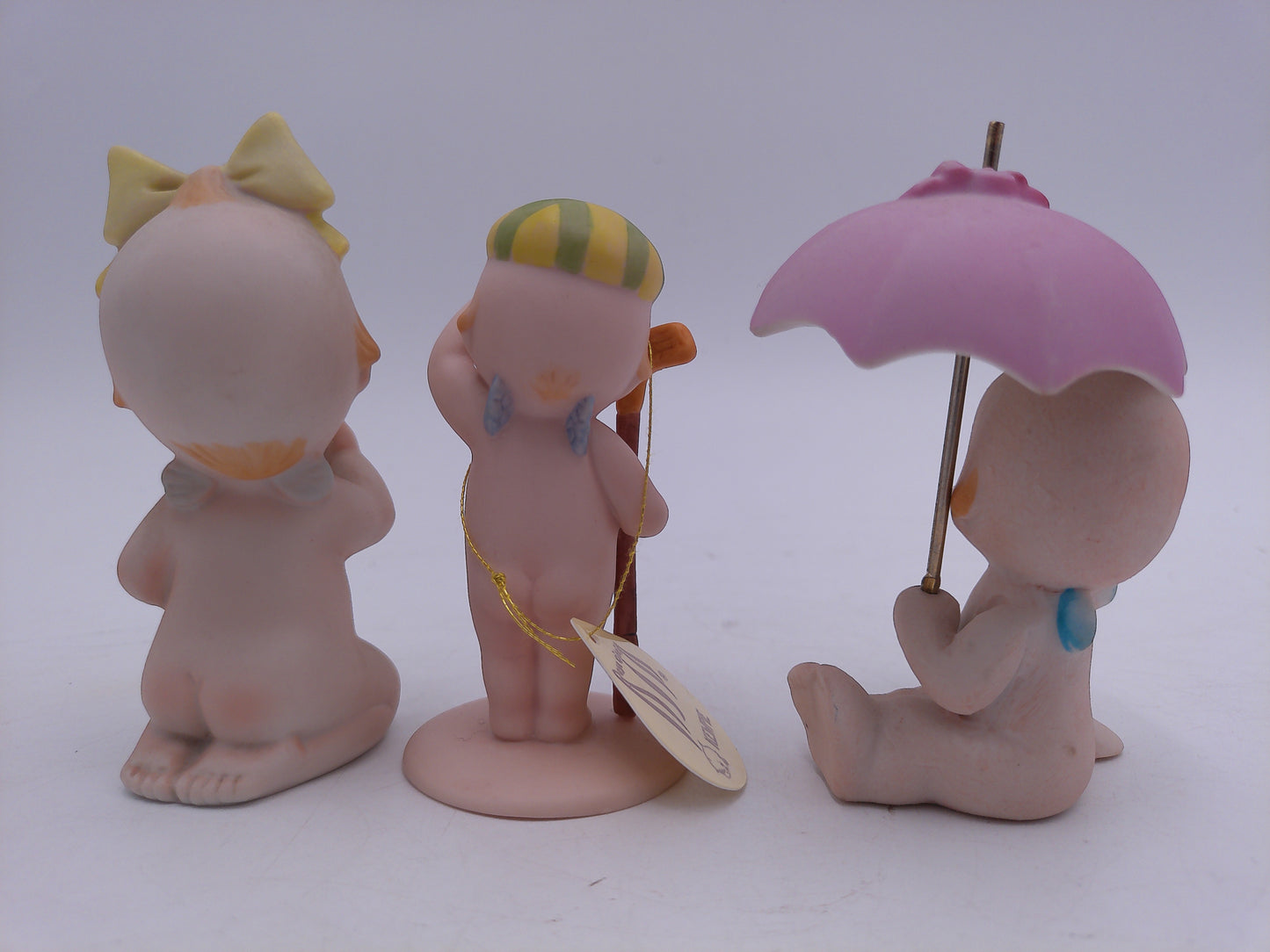 Kewpie Golfer and Unbrella with sign You Are My Sunshine