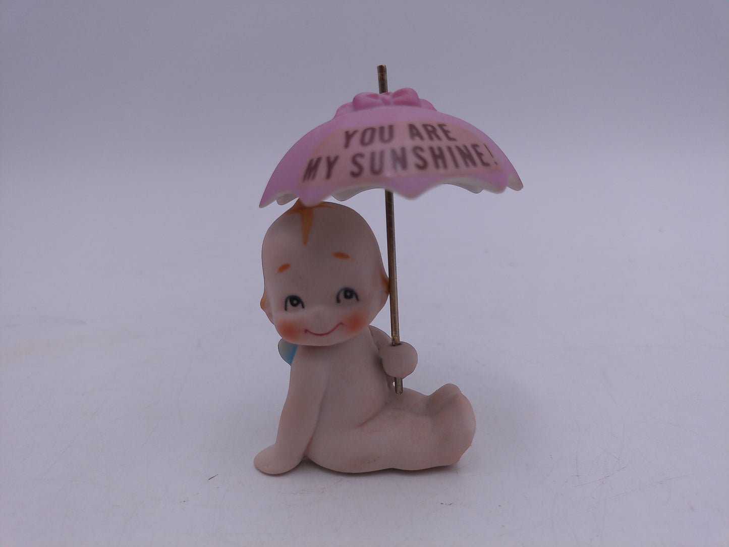 Kewpie Golfer and Unbrella with sign You Are My Sunshine