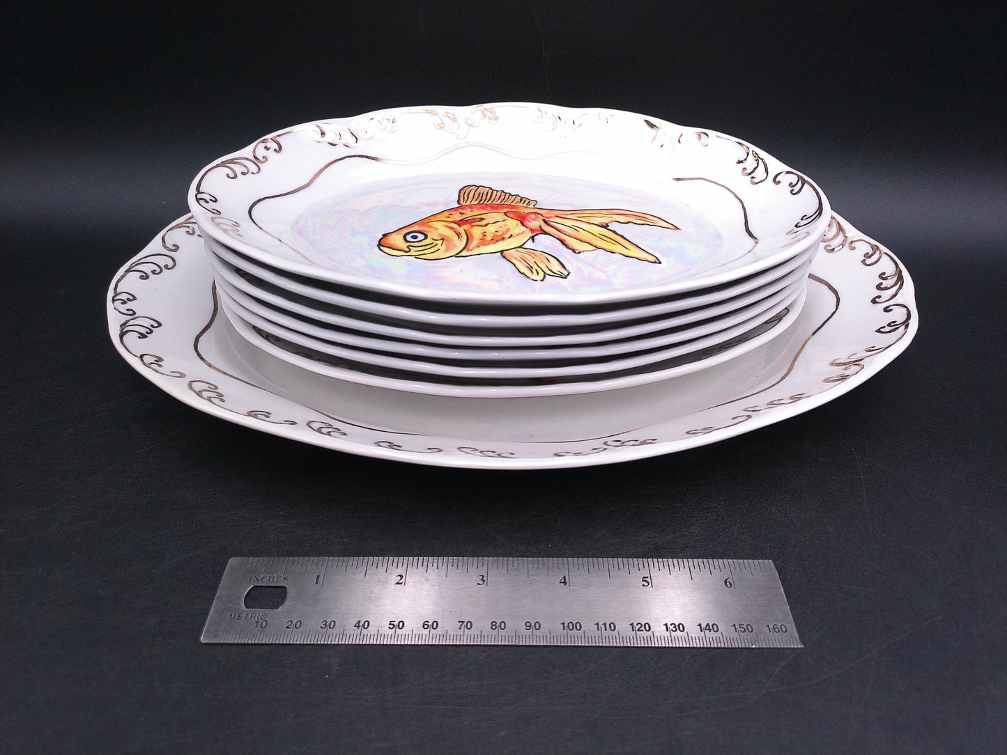 6 Different Fish Design Smaller plates and 1 bigger plates with Gold Design