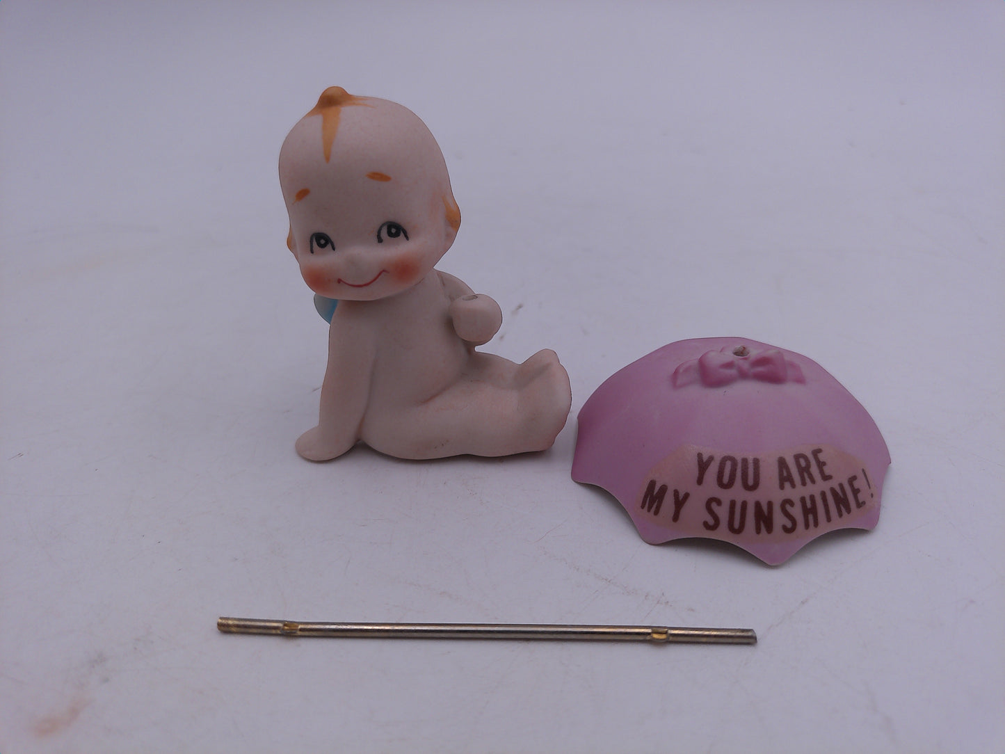 Kewpie Golfer and Unbrella with sign You Are My Sunshine