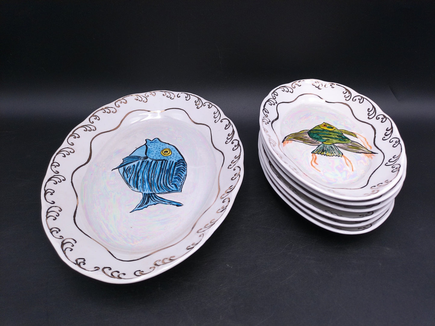 6 Different Fish Design Smaller plates and 1 bigger plates with Gold Design