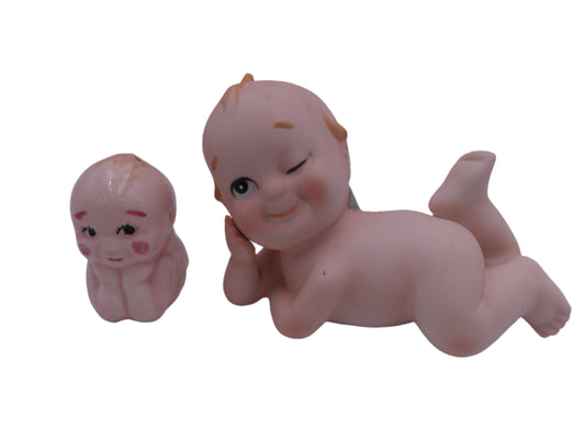 Kewpie Qty 2 lying down Vintage figurines