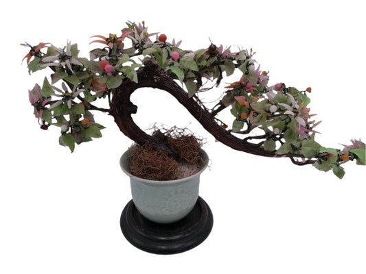 Asian hardstone bonsai form jade tree with pink salmon-colored ceramic pot