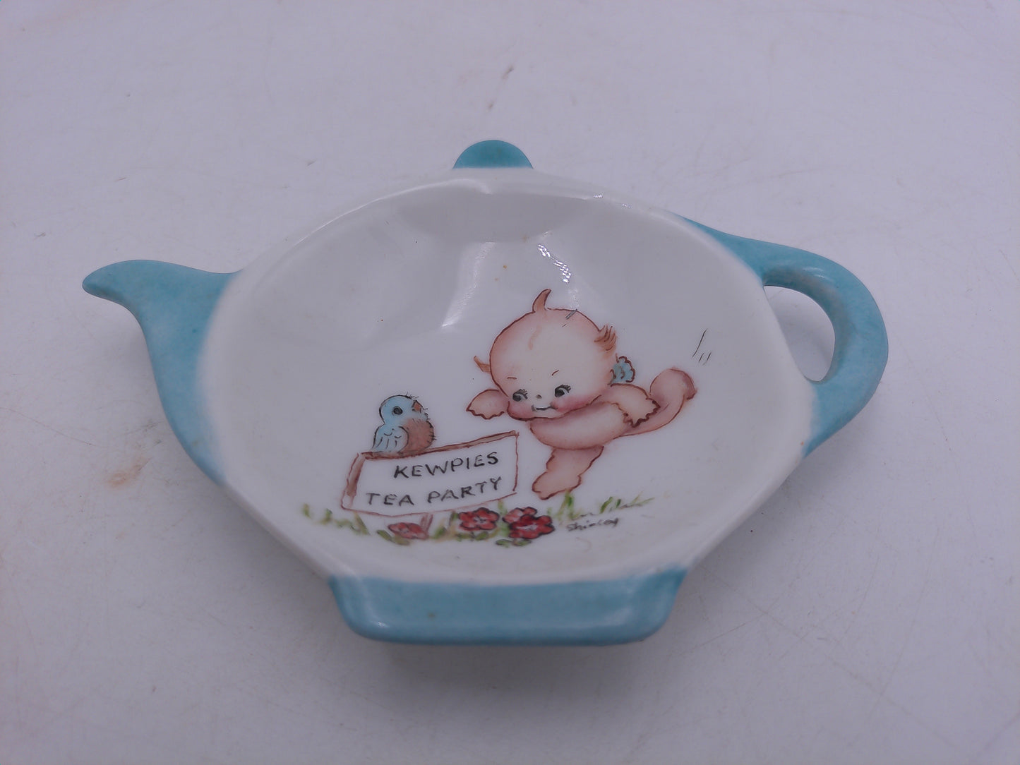 Kewpie lot of 4 items including mirrow bowl tissues