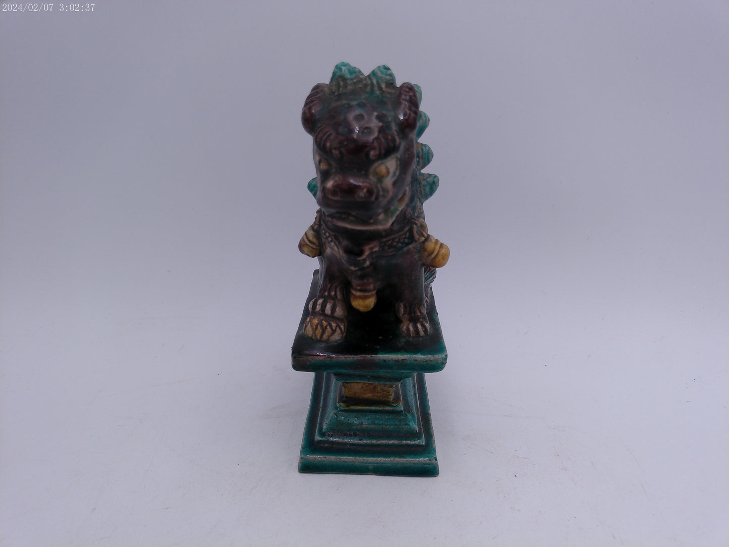 A Chinese figure of a dog-of-fo, Qing Dynasty, late 19th/early 20th century seated,