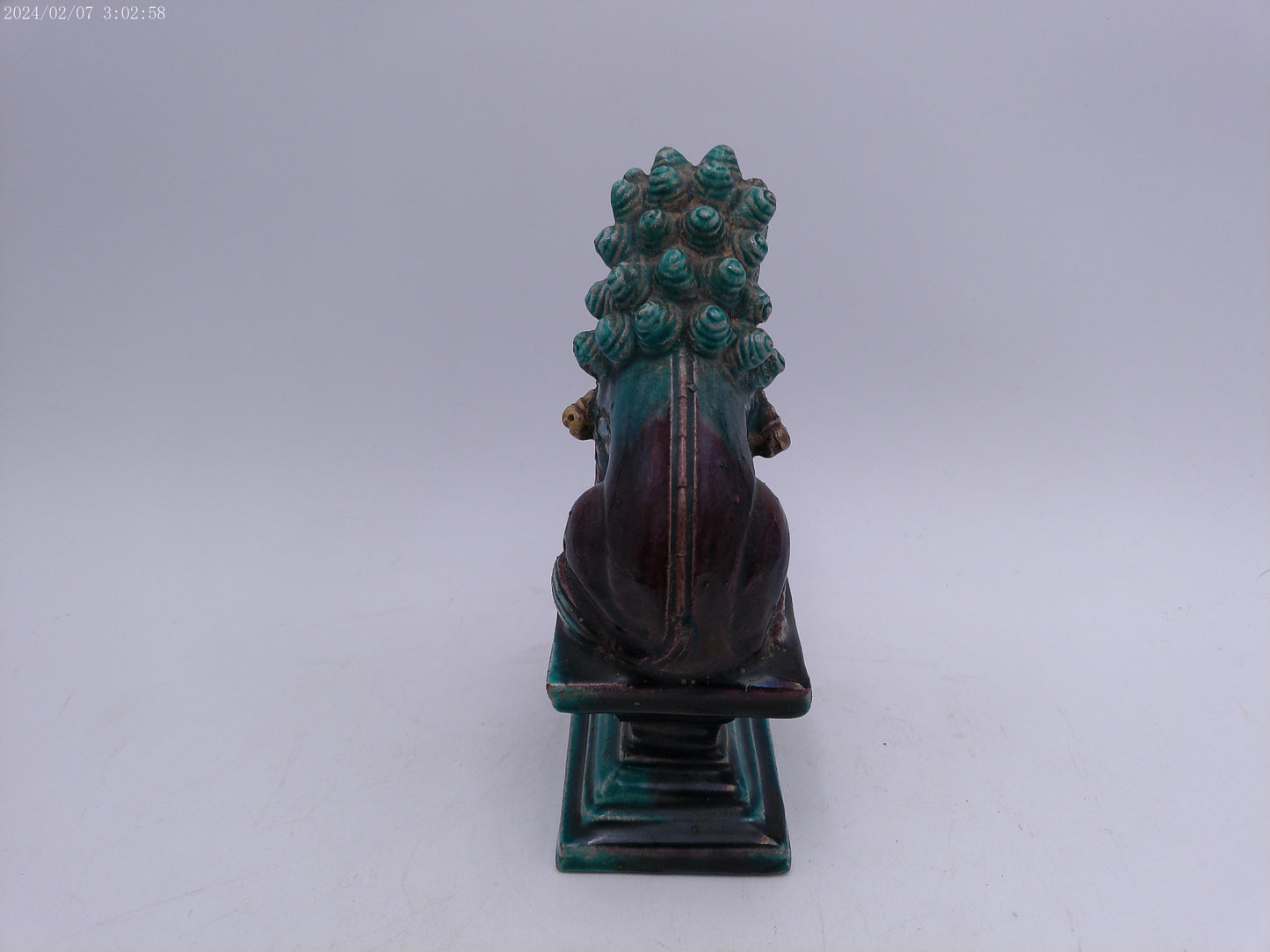 A Chinese figure of a dog-of-fo, Qing Dynasty, late 19th/early 20th century seated,