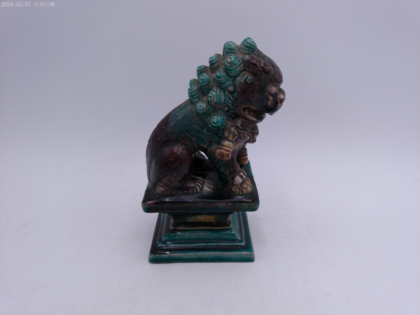 A Chinese figure of a dog-of-fo, Qing Dynasty, late 19th/early 20th century seated,