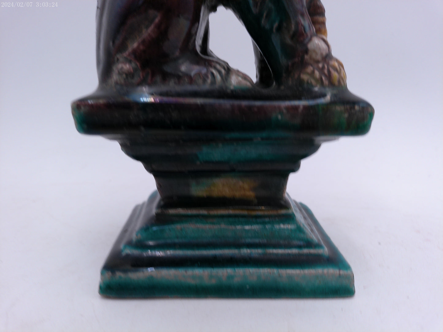 A Chinese figure of a dog-of-fo, Qing Dynasty, late 19th/early 20th century seated,