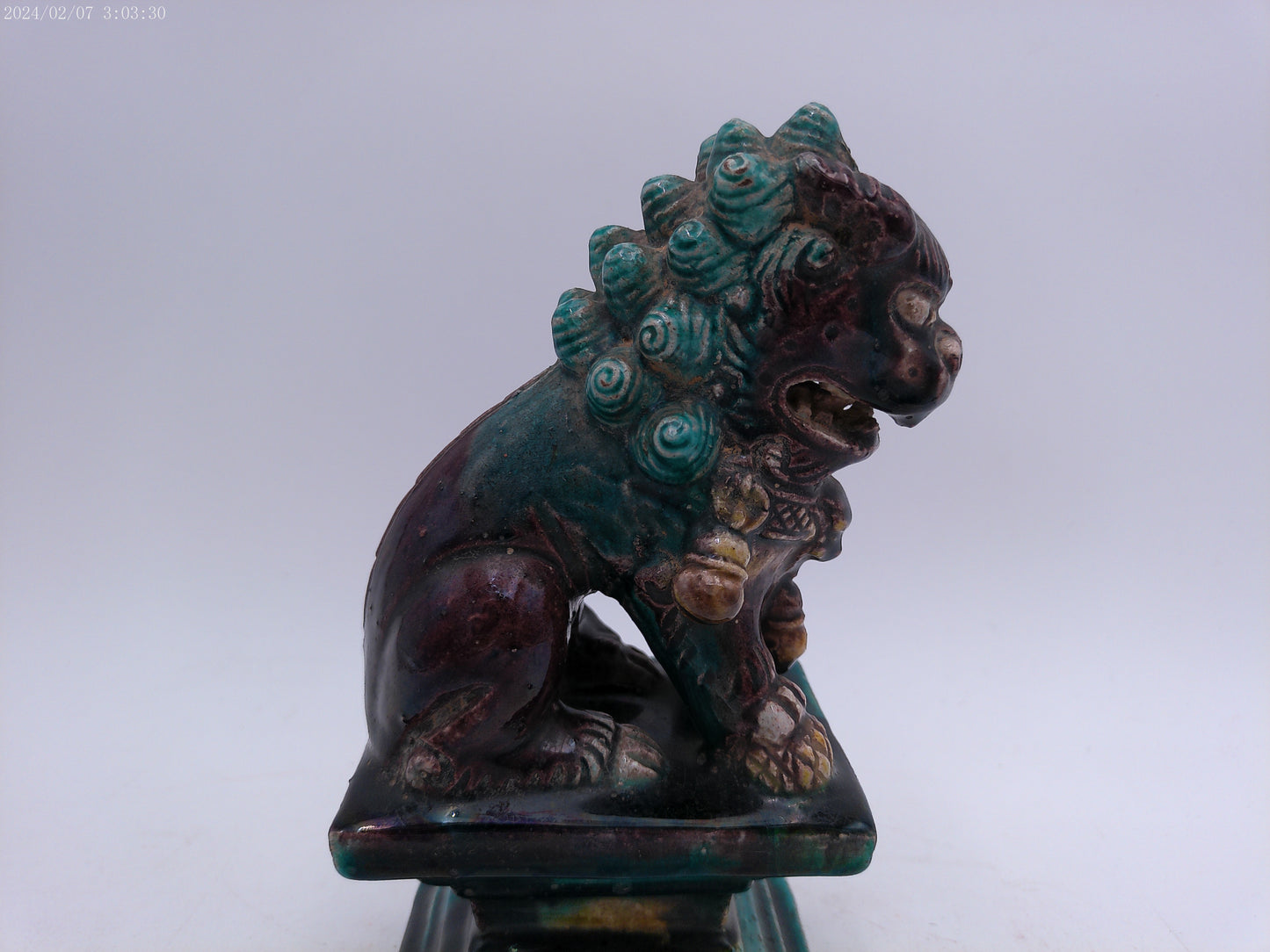 A Chinese figure of a dog-of-fo, Qing Dynasty, late 19th/early 20th century seated,