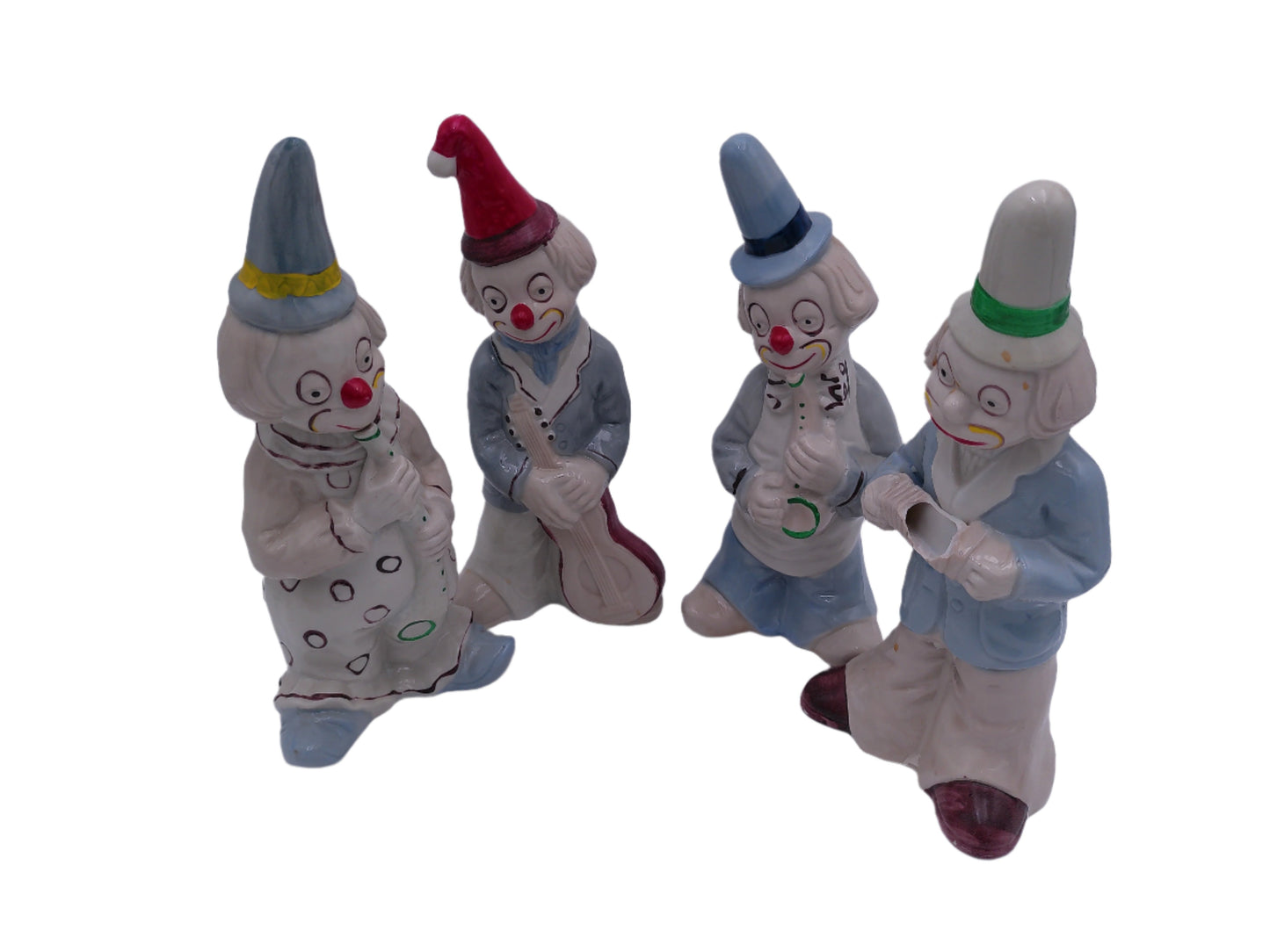 Collection of 4 Porcelain Clowns with Instruments