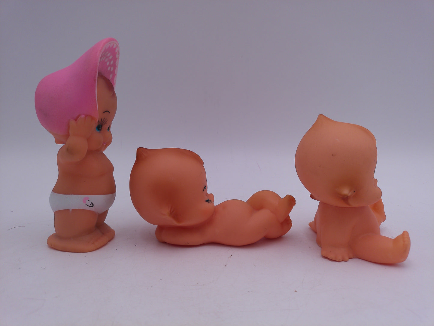 Kewpie 3 Babies Dolls one with Pink Hat