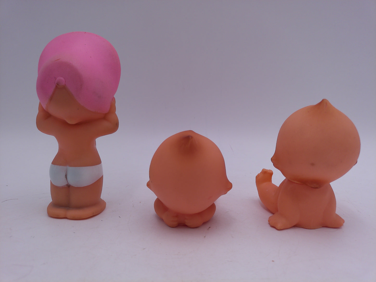 Kewpie 3 Babies Dolls one with Pink Hat