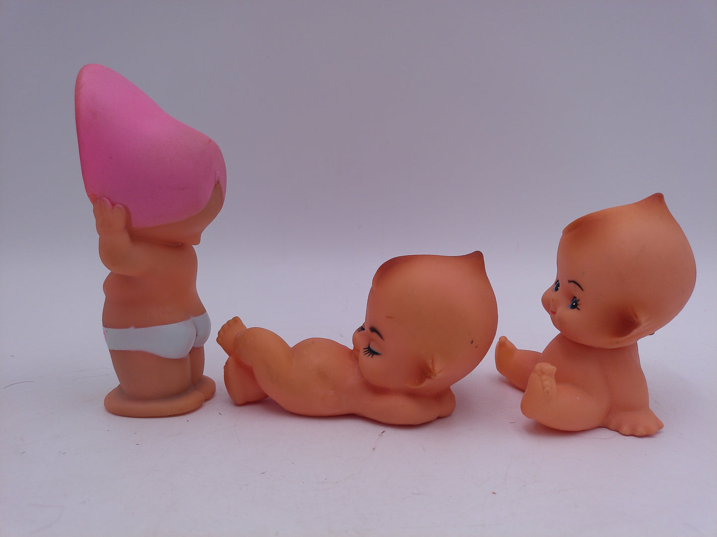 Kewpie 3 Babies Dolls one with Pink Hat