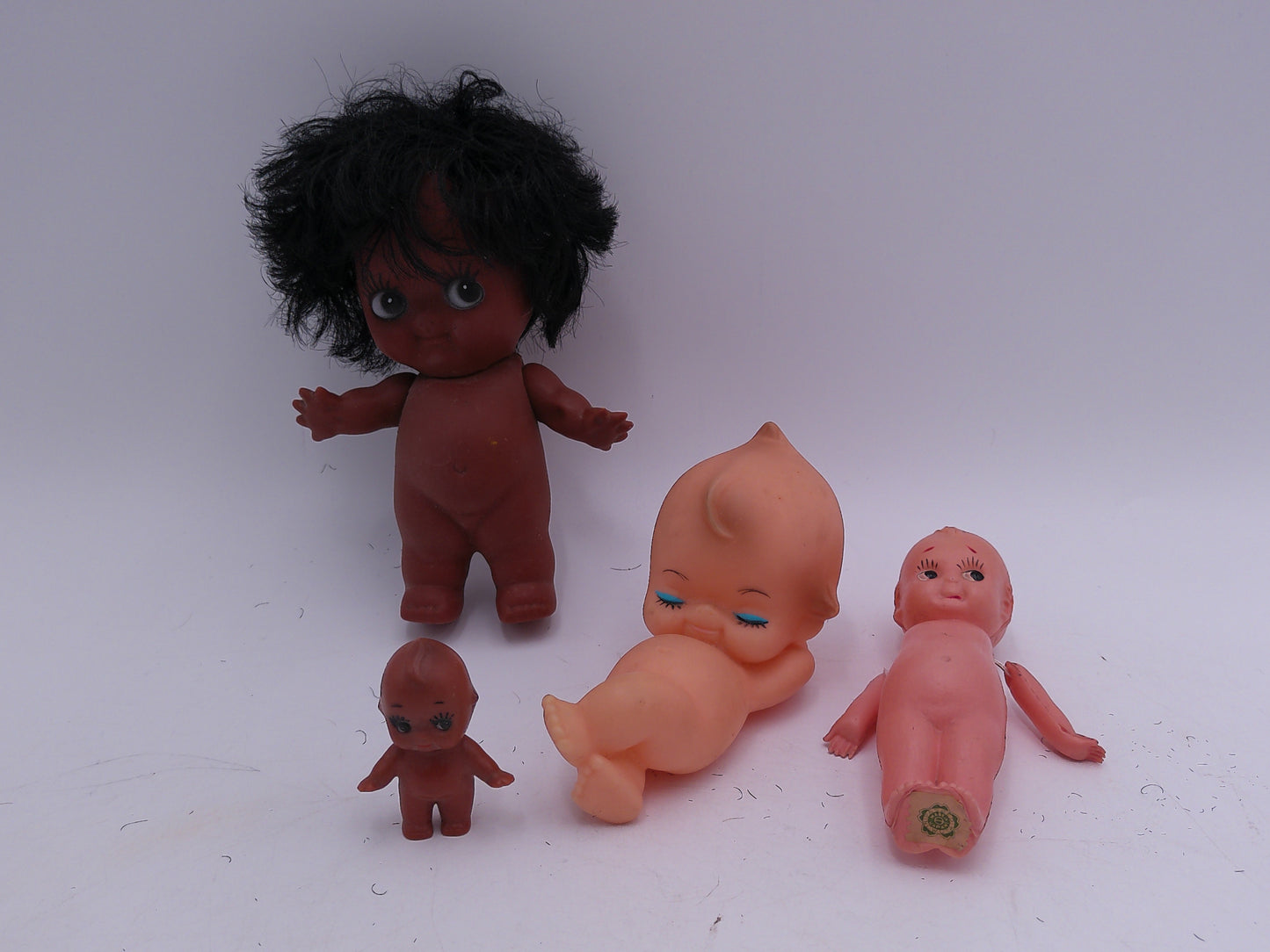 Kewpie 4 Dolls vintage