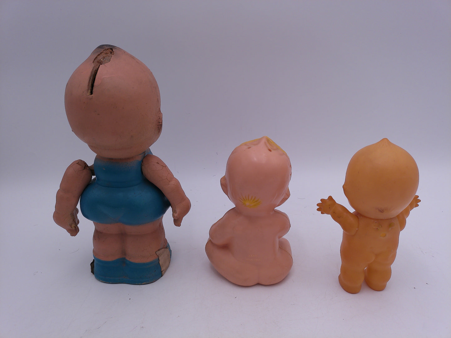 Kewpie lot of 3 Dolls one in Blue Outfit