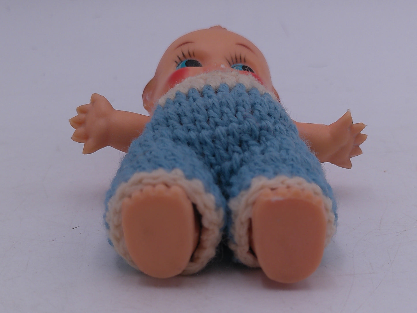 Kewpie Dolls Lot pf 3 one imight be powder dispenser and one on Blanket Vintage