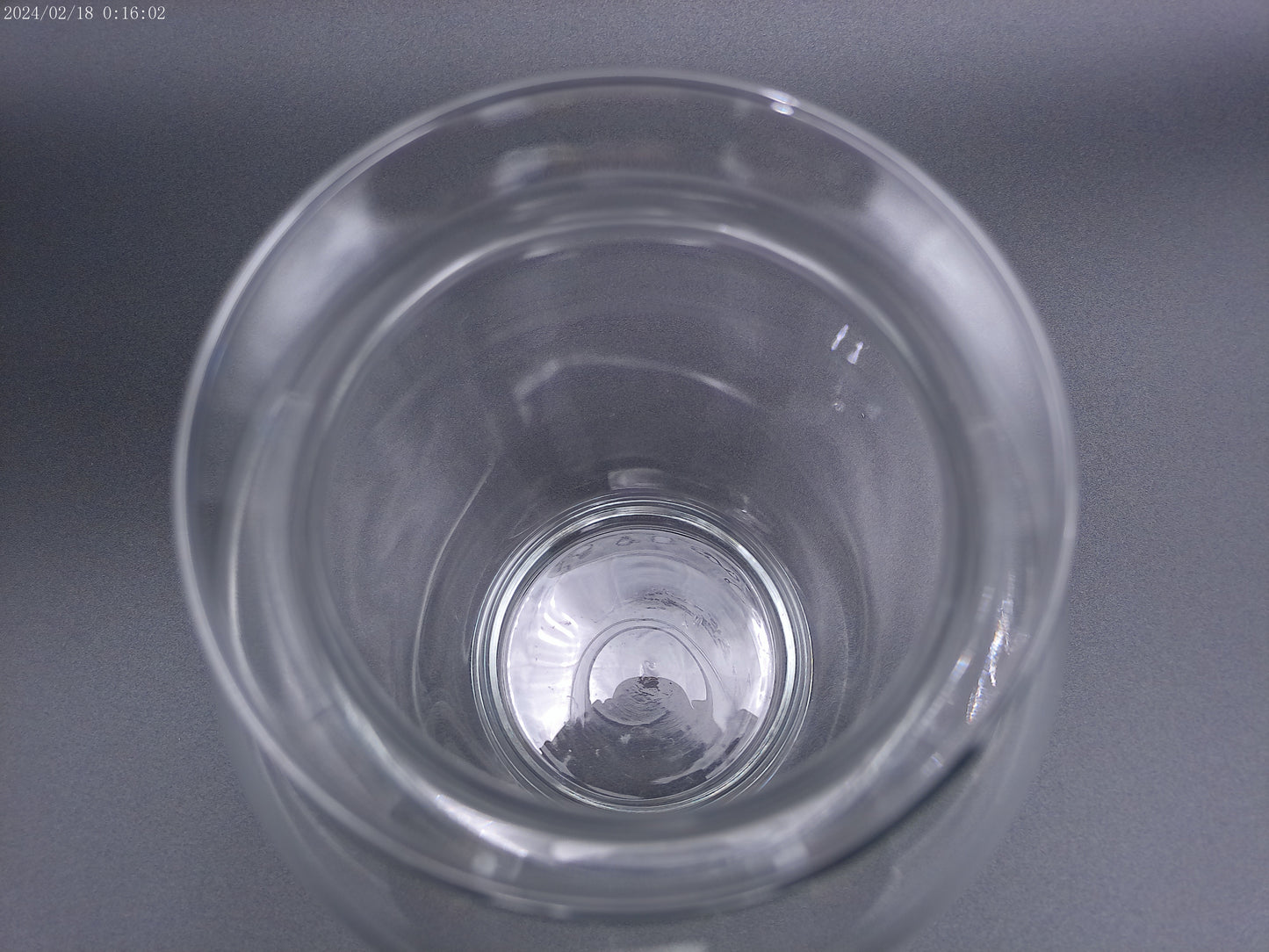 Clear glass vase is designed in a round bubble style,