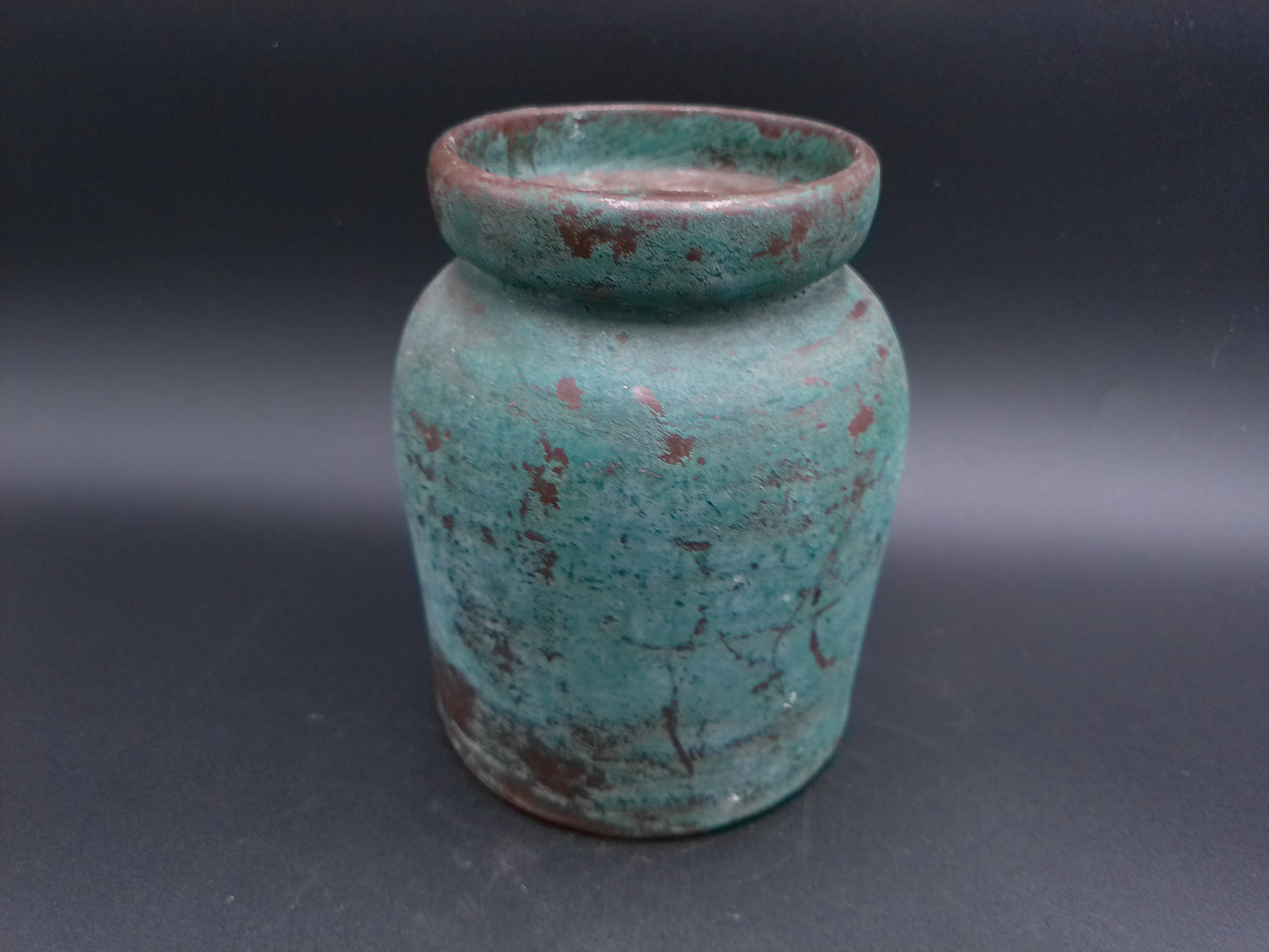 Vase Early 20th century Chinese ceramic vase. This antique farmhouse style ceramic jar has a beautifully aged emerald green glazed finish