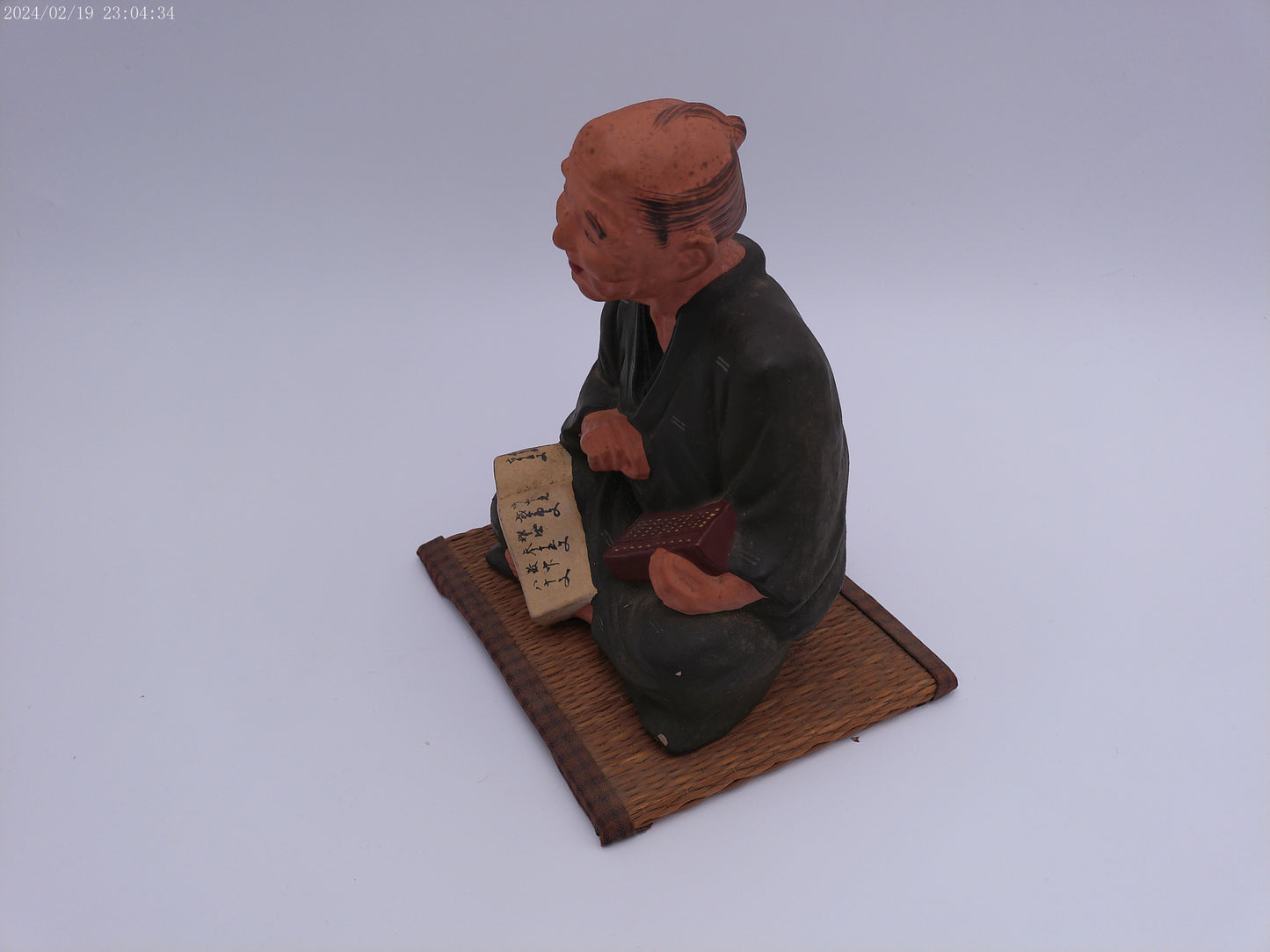 Japanese men figurine with book  vintage