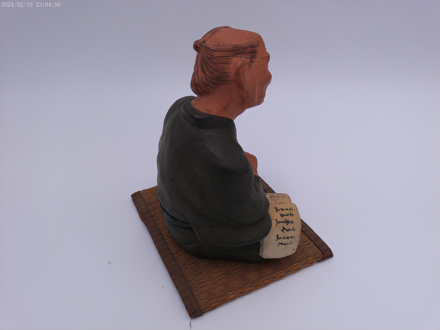 Japanese men figurine with book  vintage