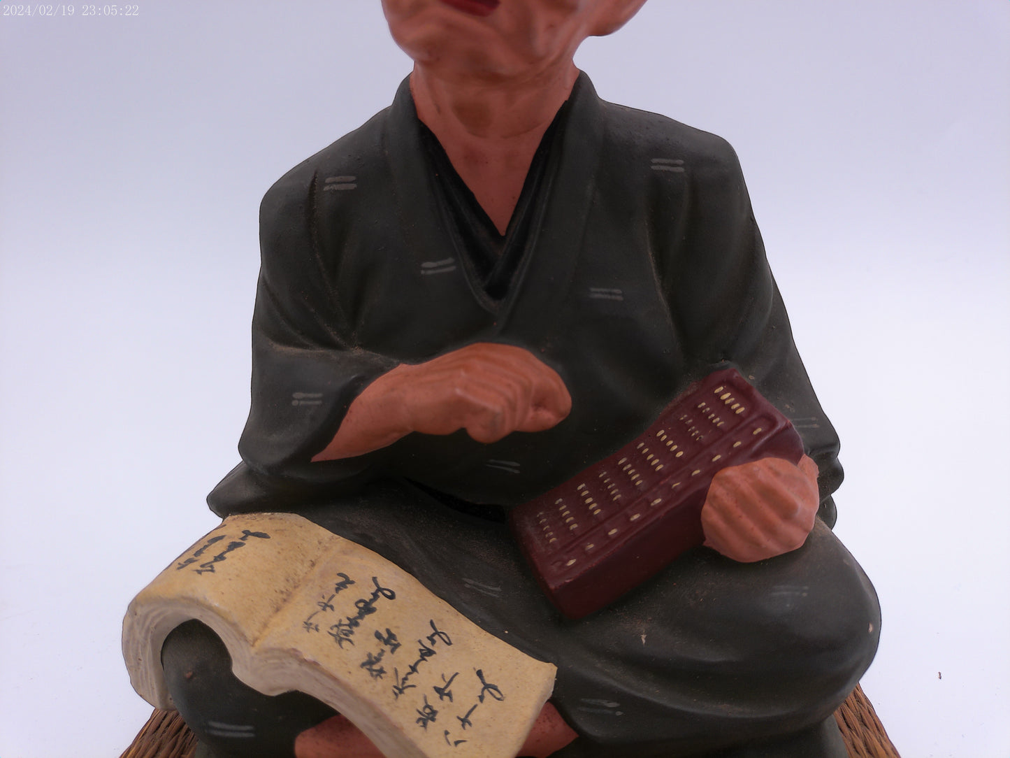 Japanese men figurine with book  vintage