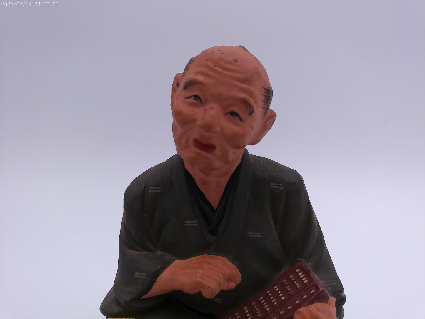 Japanese men figurine with book  vintage