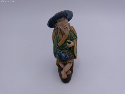 Ancient Chinese statue Mudman Sitting Statue