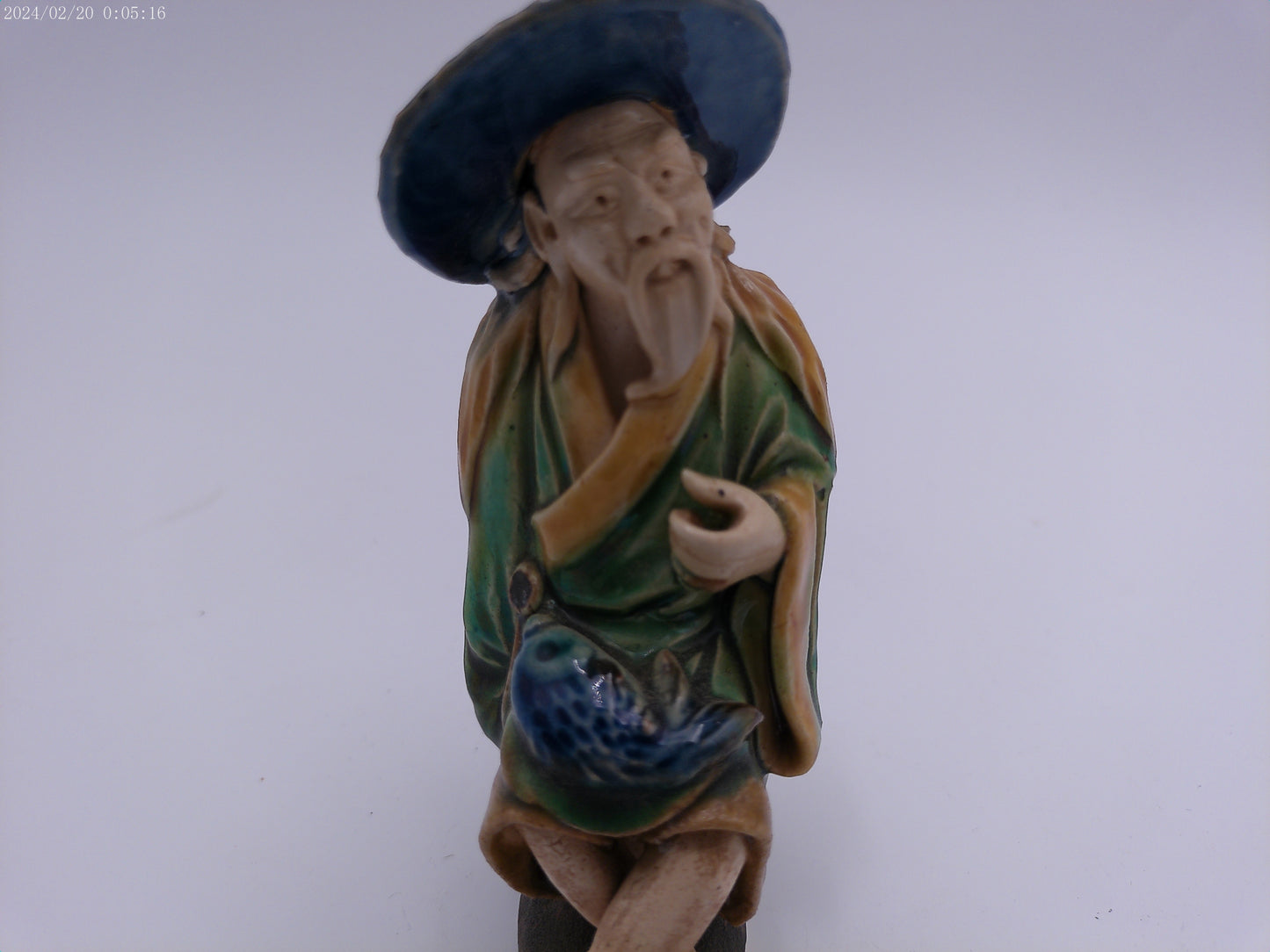 Ancient Chinese statue Mudman Sitting Statue