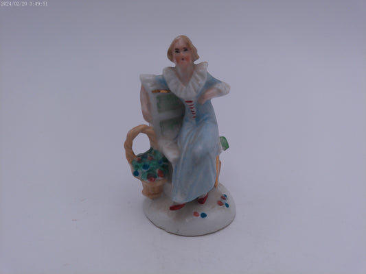 Lady in Dress Sitting On Chair  Decorative Ceramic Figurine Vintage